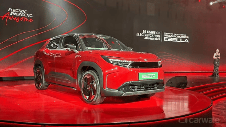 Toyota Ebella EV Launch: सिंगल चार्ज में 543KM रेंज, 8 साल की बैटरी वारंटी! पहली इलेक्ट्रिक कार पेश